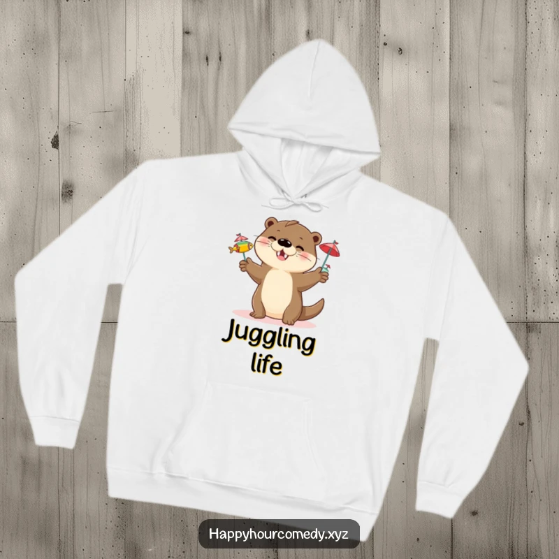 Funny Otter Juggling Hoodie: Happy otter character juggling three small fish with tiny cocktail umbrellas, snuggly funny gift.