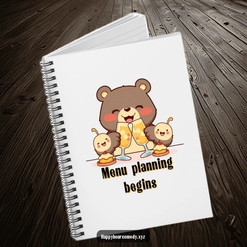 Funny Bear Appetizer Notebook shows a joyous bear clinking glasses with tiny, smiling appetizers, perfect for jotting down tasty ideas.