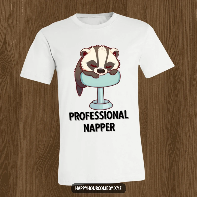 Funny Sleepy Badger T-Shirt shows a sleepy badger attempting to get comfortable on a plush bar stool, looking cozy and relatable.